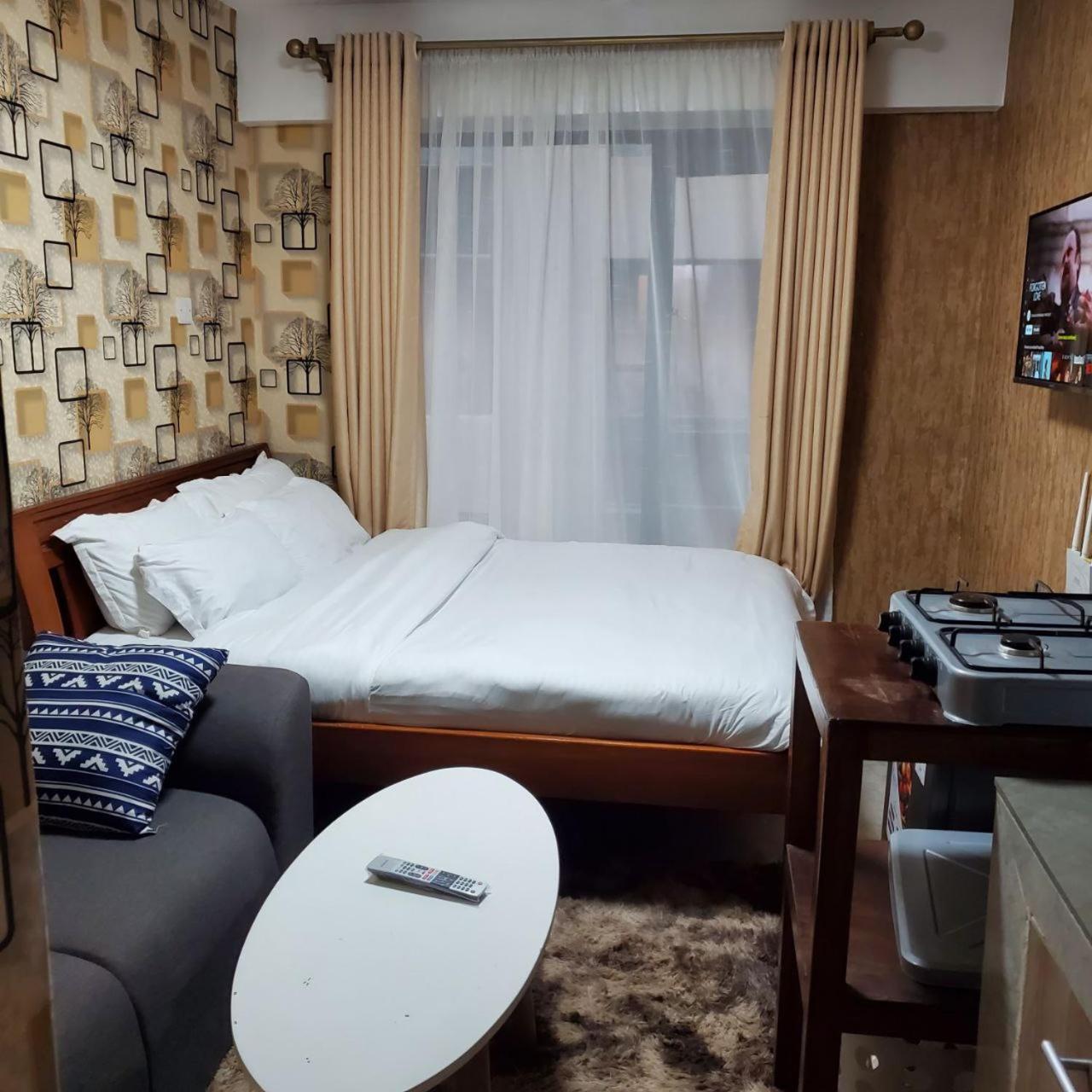 Apartamento Lovely & Cozy Compact Studio Near Airport With Rooftop View Nairobi Exterior foto