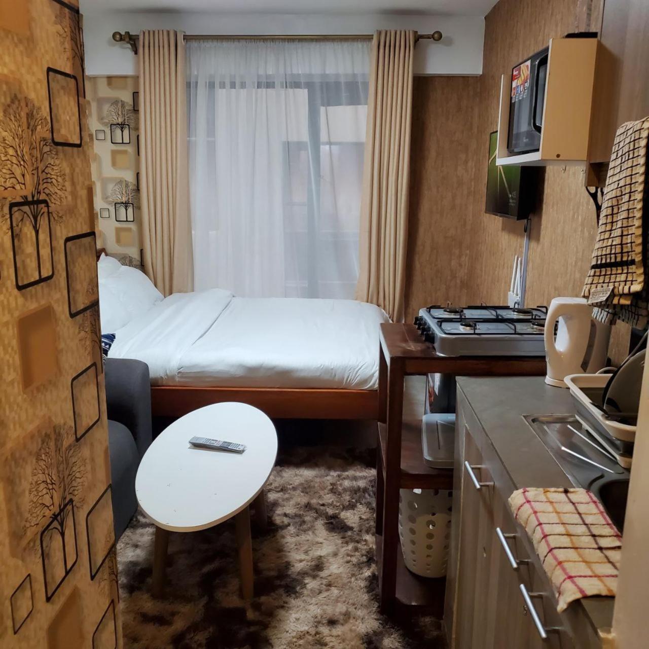Apartamento Lovely & Cozy Compact Studio Near Airport With Rooftop View Nairobi Exterior foto